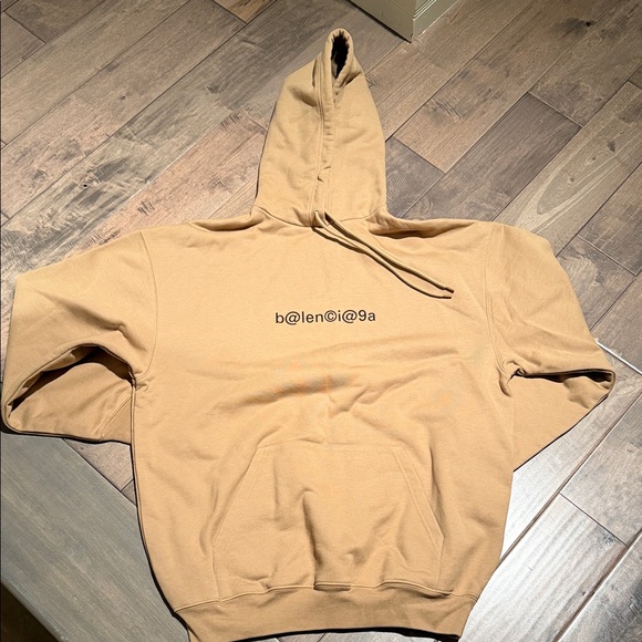 Tan over-sized balenciaga hoodie size extra-small, women’s.